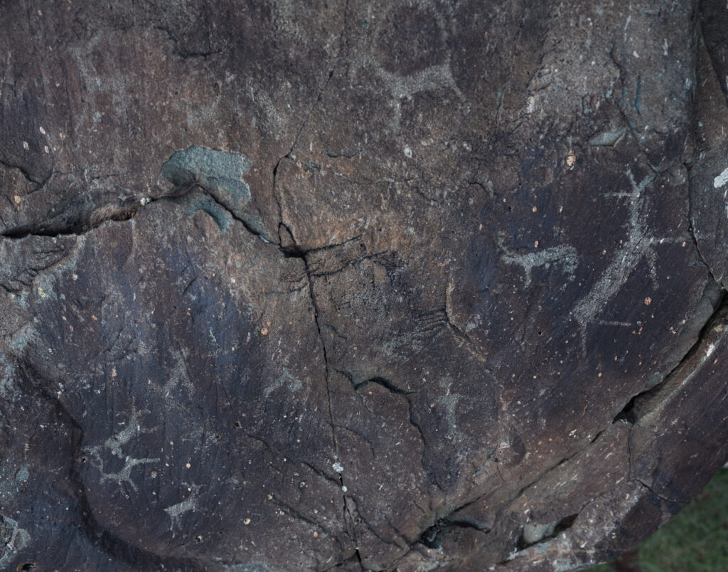 Rocky formation with rough surface and painting